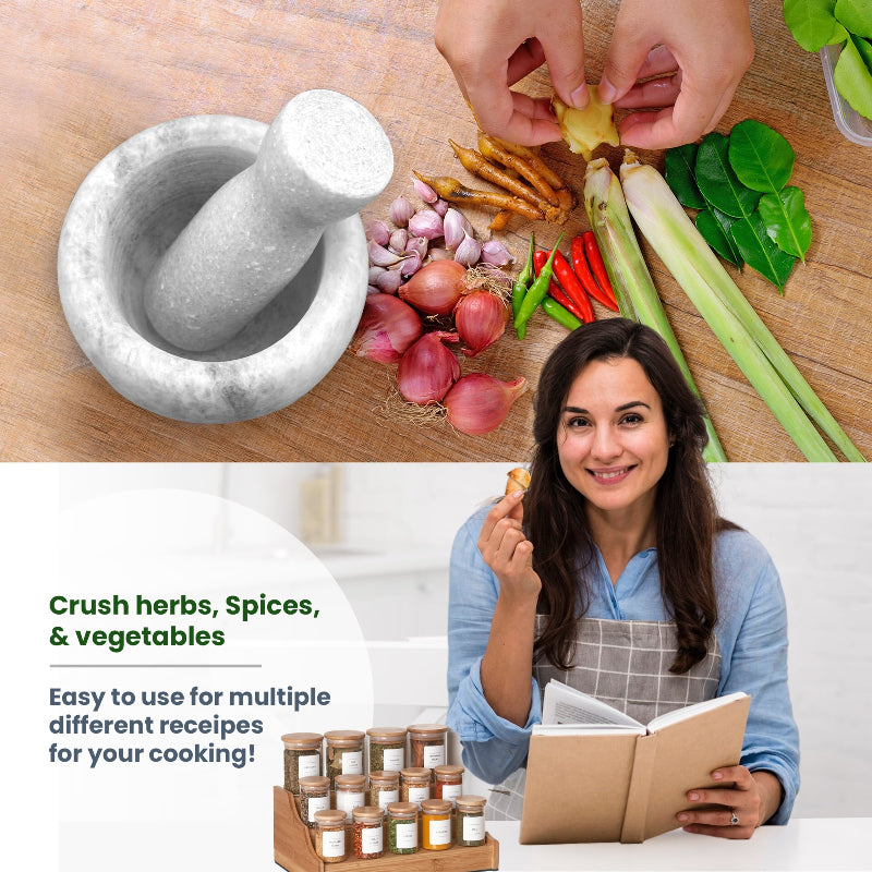 Mortar and pestle with ingredients on a cutting board, woman reading a cookbook with spice jars below.