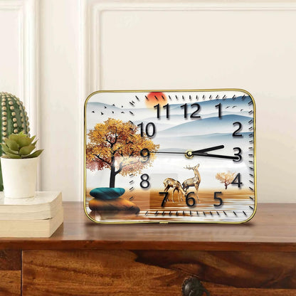 Decorative clock with nature design on a wooden surface