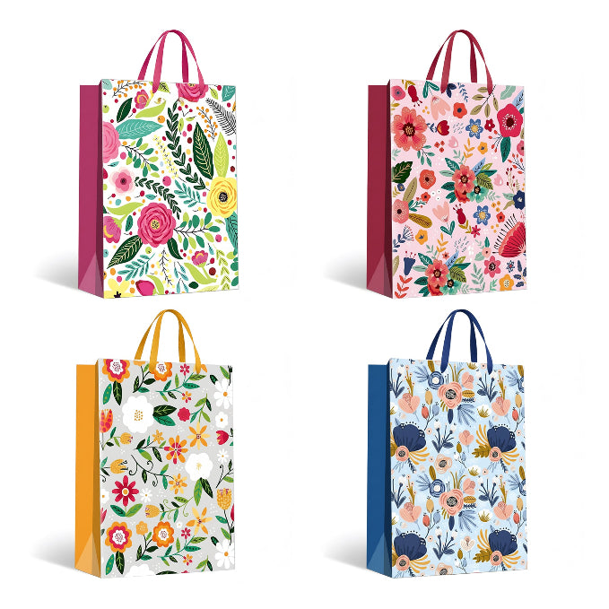 Four floral-patterned shopping bags with different color handles on a white background