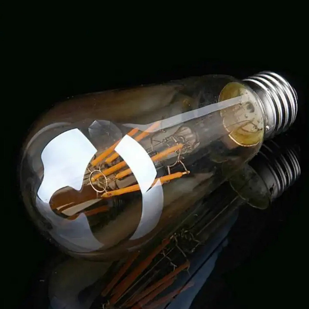 Dimmable ST64 LED Filament Bulb Amber – E27 & B22 - photo 14