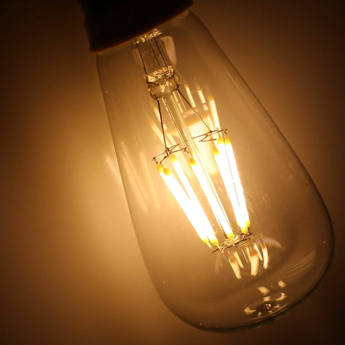 Dimmable ST64 LED Filament Bulb Amber – E27 & B22 - photo 24